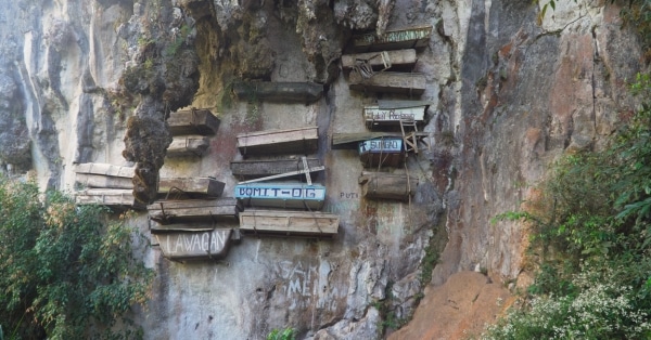 1. Embark on a Trek to the Hanging Coffins