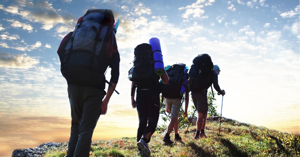 Hikers with complete gear and set up